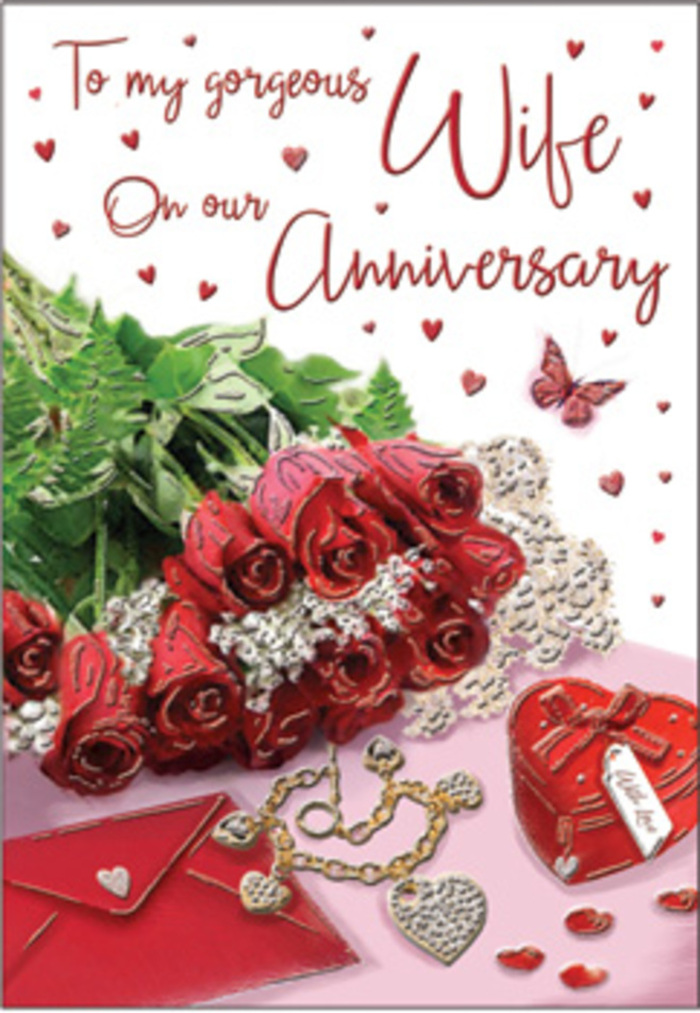In this richly detailed anniversary card design, a bouquet of classic red roses takes pride of place, as if resting on a polished surface in a serene corner of Clapham. Each rose is luxuriously full, its petals layered in deep, velvety spirals of crimson that draw the gaze inward, conveying both passion and reassurance. The flowers are elegantly wrapped and entwined with lush greenery, the leaves arching and curving around the blooms in natural, flowing lines that conjure the soft greenery found along the paths of Clapham Common. Around the bouquet, a series of meaningful accents completes the tableau. A vivid red jewellery box sits nearby, bold in colour yet smooth and compact, its lid hinting at the possibility of a new piece of jewellery or a keepsake exchanged over many anniversaries. Next to it, a jewellery set glimmers delicately, catching the light in small flashes of gold and silver, suggesting the refined sparkle of something treasured and worn often. Whisper-thin lace and delicate heart motifs are scattered across the setting, their pale tones and intricate textures playing gently against the rich reds and greens, much like the contrast of period architecture and leafy streets in Clapham's residential lanes. A folded card, its scripted message visible in flowing, romantic lettering, anchors the scene with a personal touch, reminding the viewer that this image celebrates real emotions and shared stories. The interplay of velvet-like petals, metallic jewellery, and soft textiles creates a sense of warmth and closeness, as though the entire arrangement were prepared by a local florist with an instinct for romance. The atmosphere is tender and embracing, a visual echo of an anniversary dinner at home, quiet music, and an evening spent reflecting on how love deepens over time.